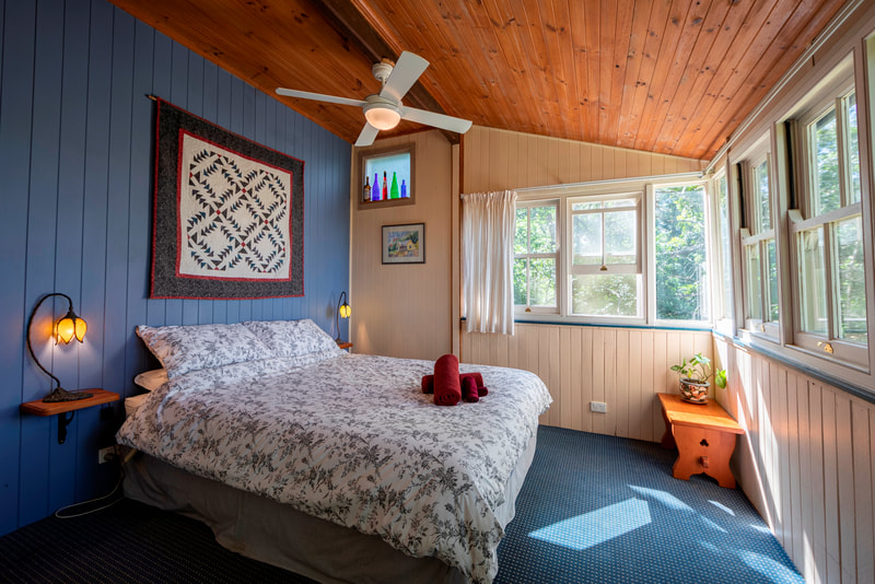Mount Glorious accommodation bedroom with forest views