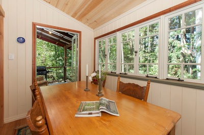 Mount Glorious accommodation dining room with forest views