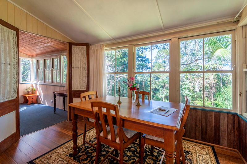 Mount Glorious accommodation dining room with forest views
